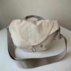Magnetic bag sports crossbody bag for women fitness cycling waist bag nylon dumpling shoulder bag for men